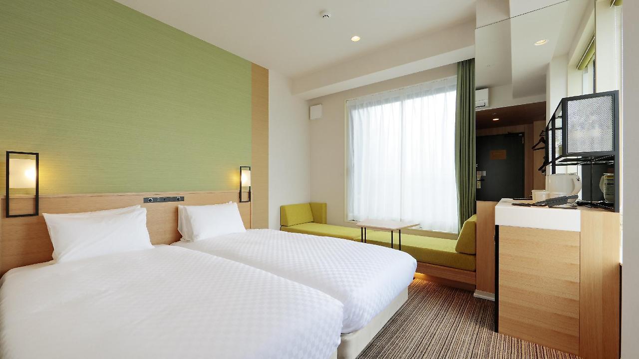 Candeo Hotels Osaka Kishibe Суйта Экстерьер фото